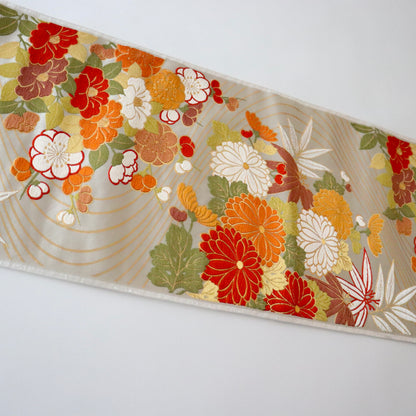 袋帯「流水菊椿文」梅垣織物