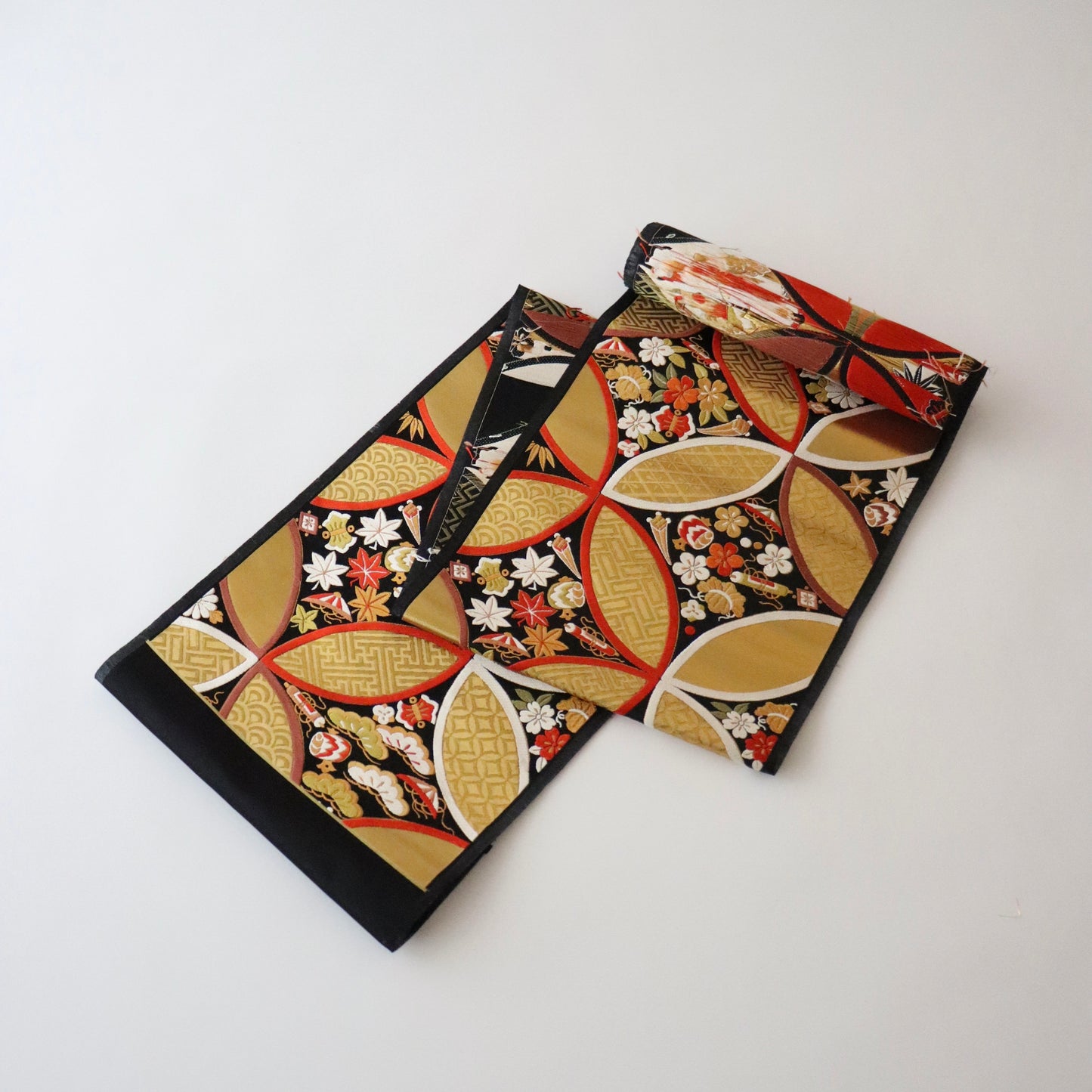 袋帯「慶長小袖七宝文」梅垣織物