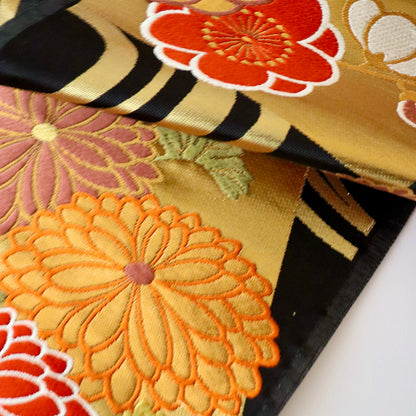 袋帯「流水色紙花文」梅垣織物