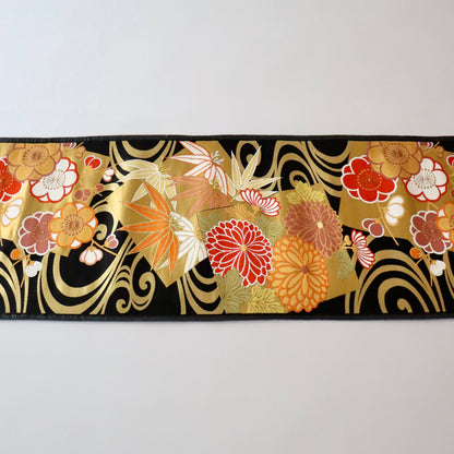 袋帯「流水色紙花文」梅垣織物