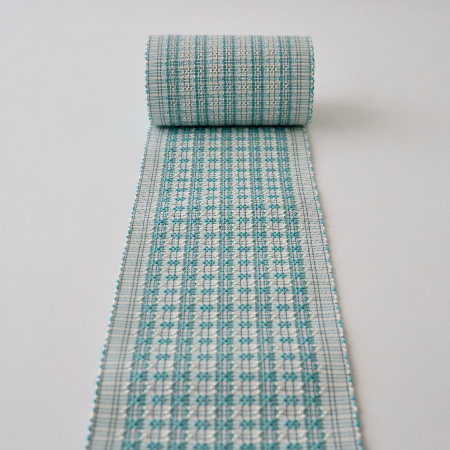 四寸帯「首里道屯織 -lt.grn」富原あい