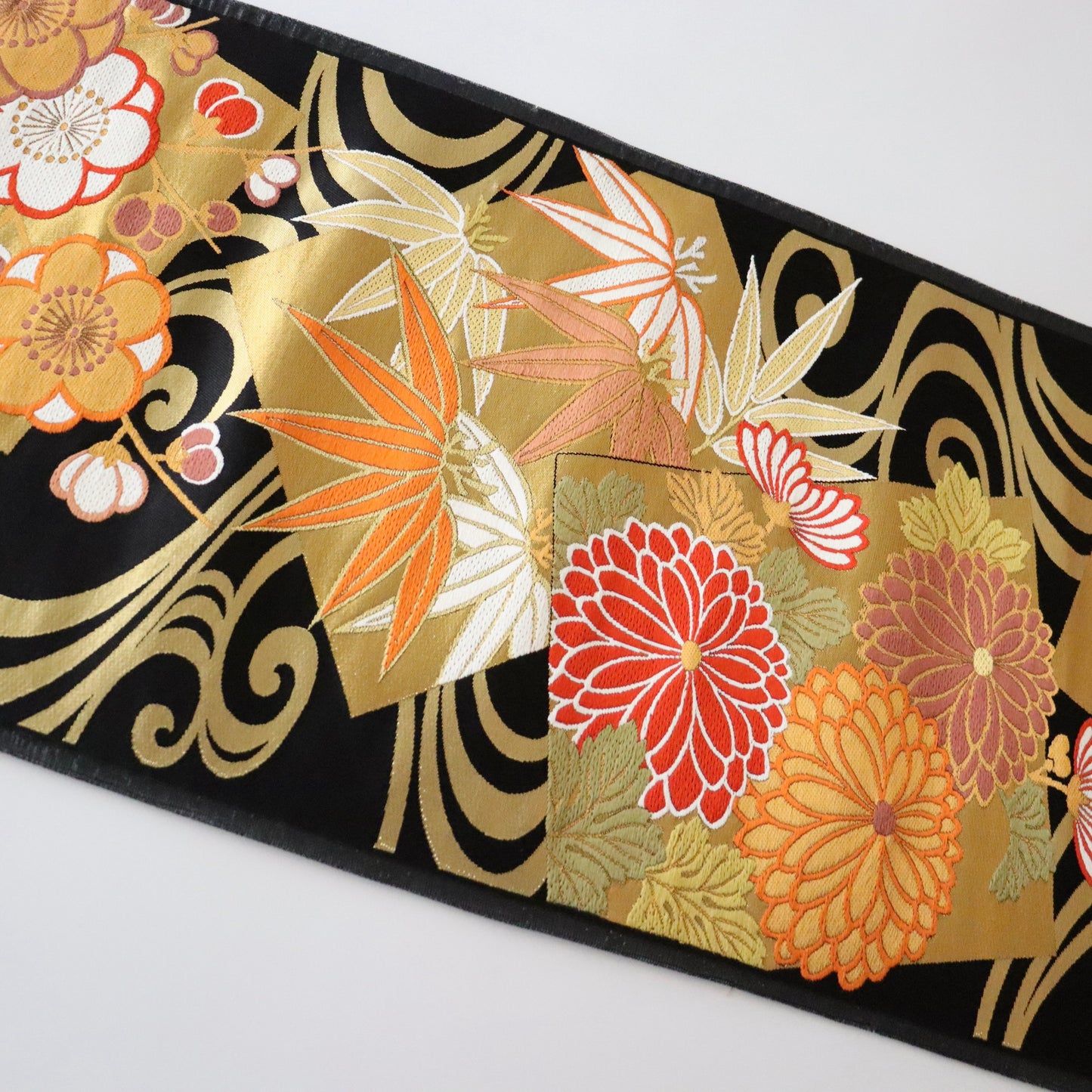 袋帯「流水色紙花文」梅垣織物