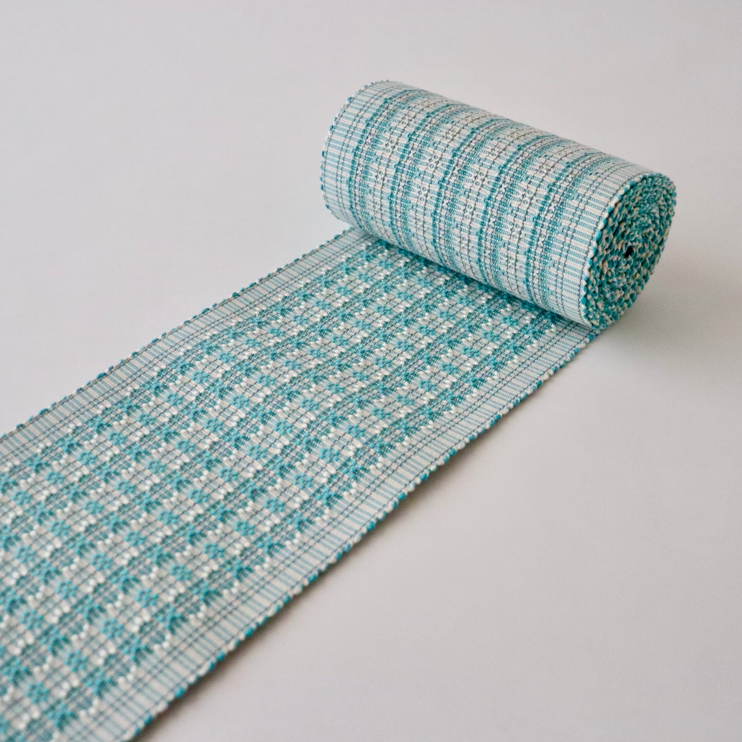 四寸帯「首里道屯織 -lt.grn」富原あい