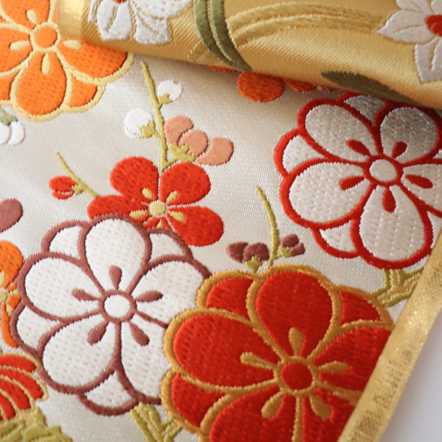 袋帯「春秋花丸文」梅垣織物