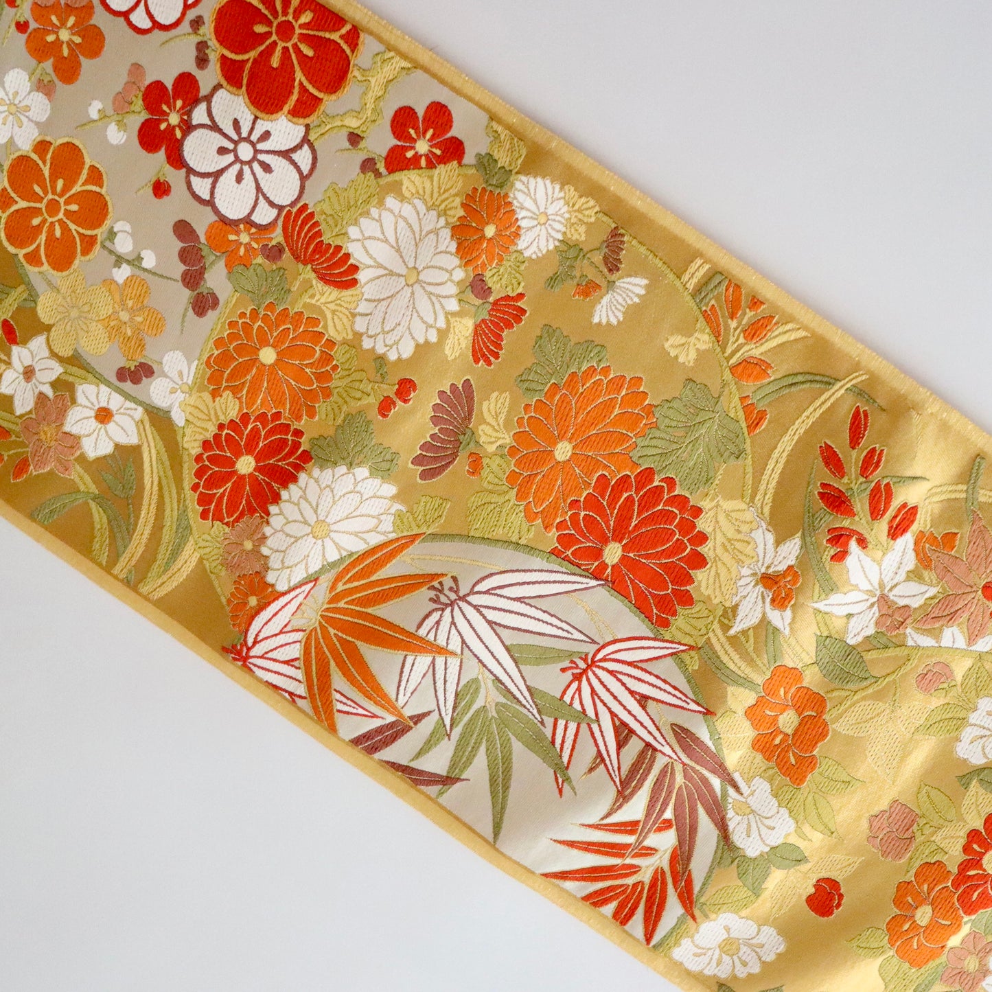 袋帯「春秋花丸文」梅垣織物