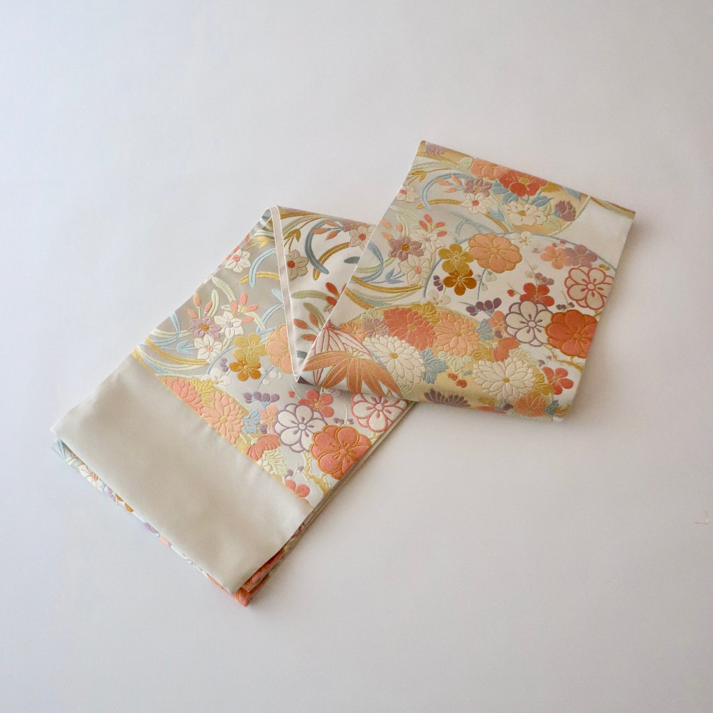 袋帯「春秋花丸文」梅垣織物