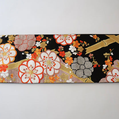 袋帯「竹垣梅花文」梅垣織物