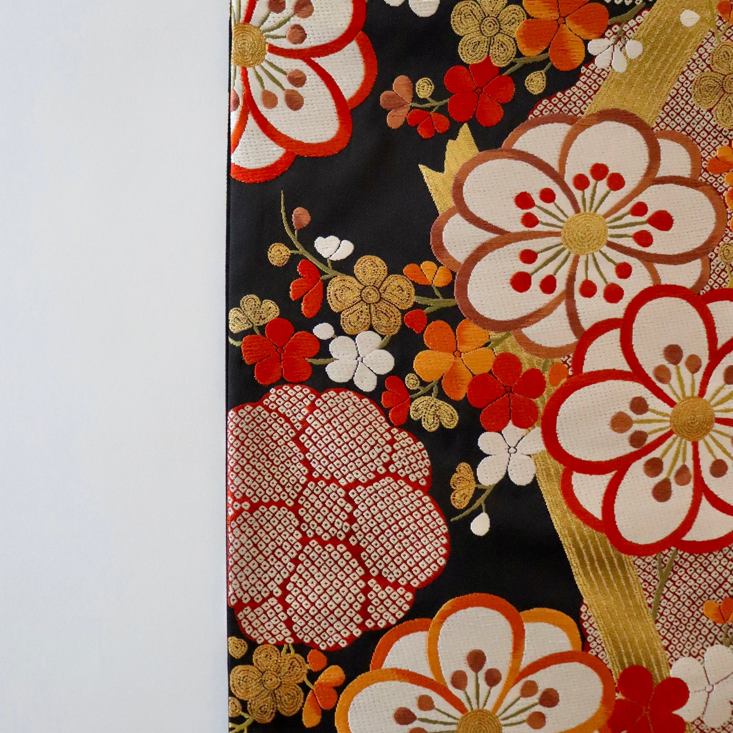 袋帯「竹垣梅花文」梅垣織物