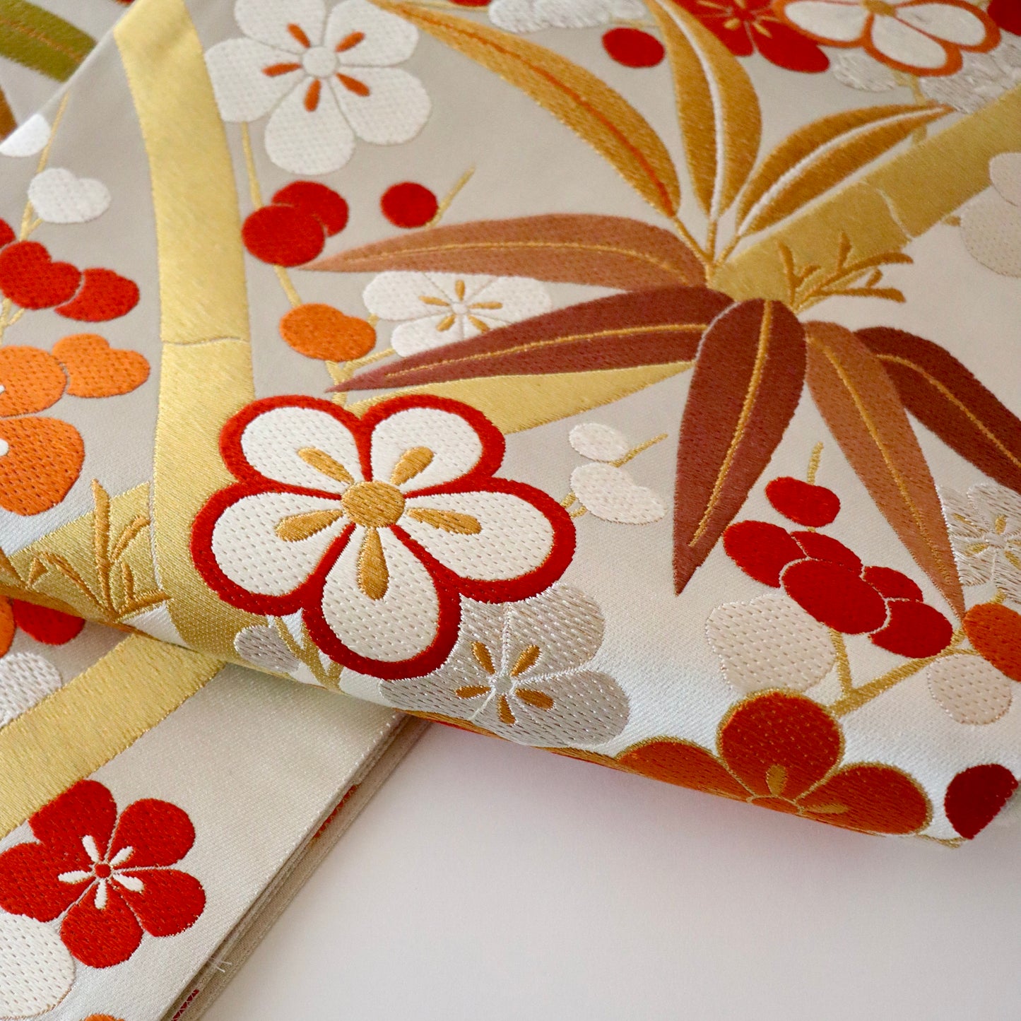 袋帯「松竹梅花文」梅垣織物