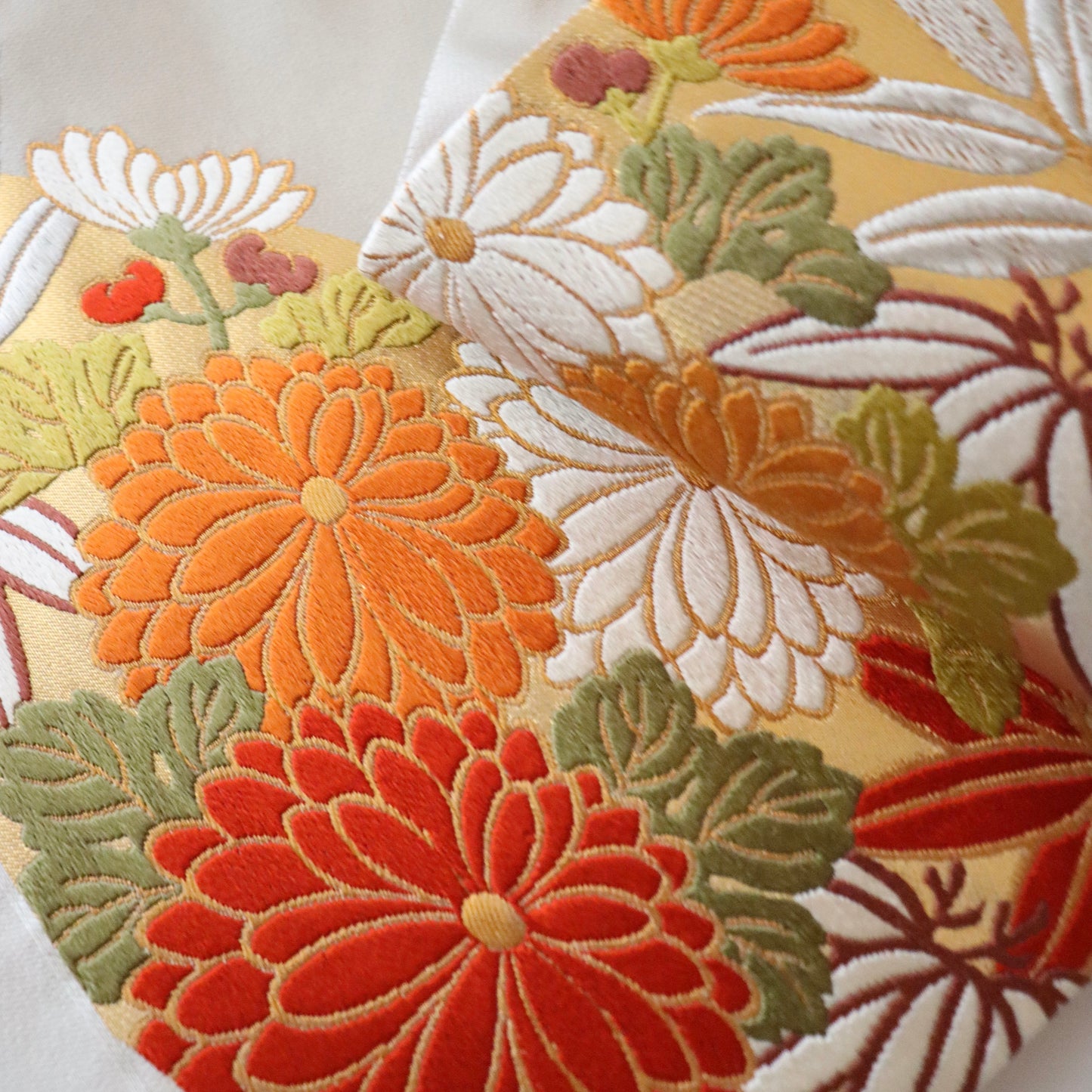 袋帯「斜取春秋花文」梅垣織物