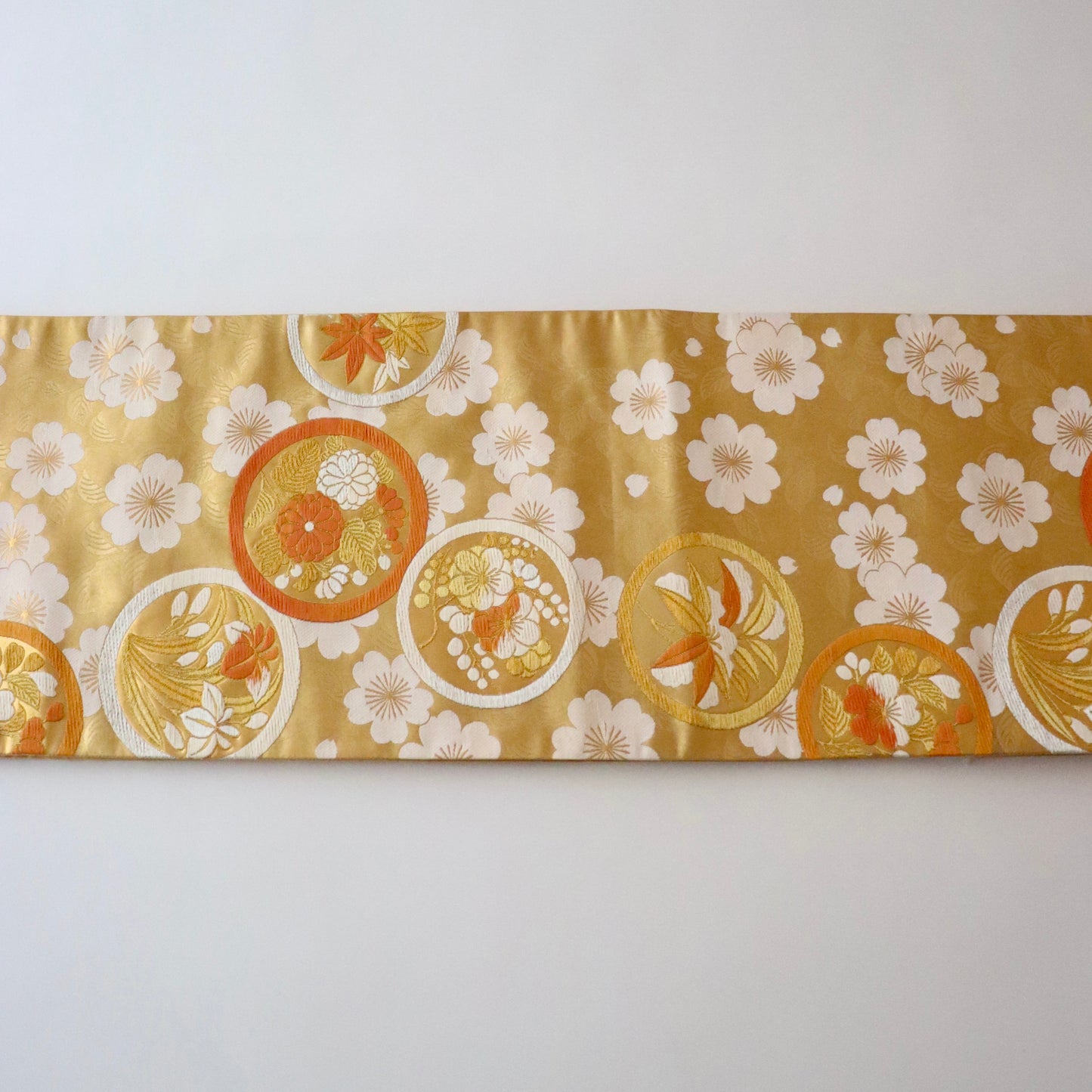 袋帯「桜狂言丸文」梅垣織物