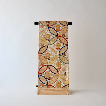 袋帯「彩七宝寿蝶華文」河合美術織物