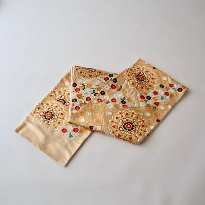 袋帯「裂形名錦寿宝文」河合美術織物