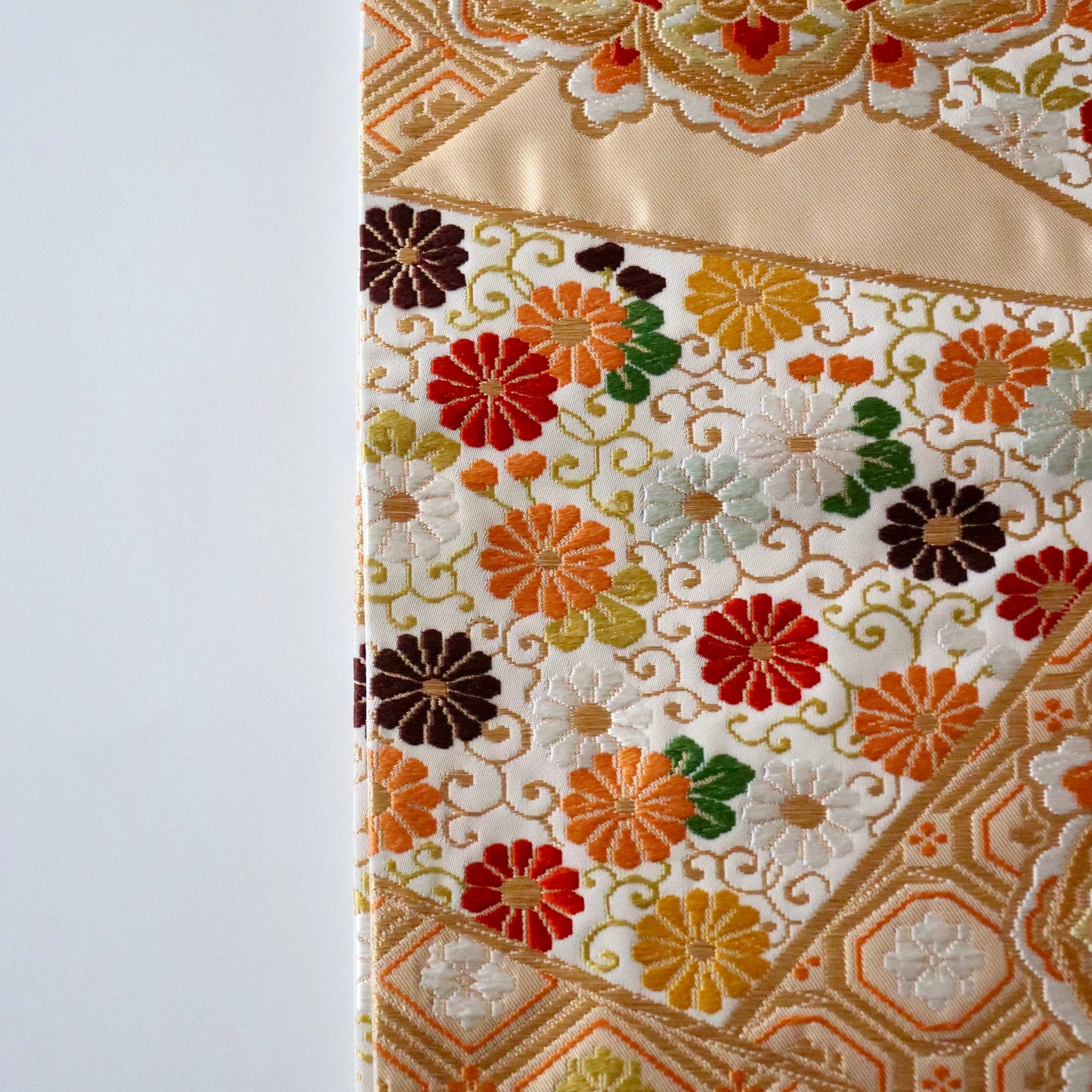 袋帯「裂形名錦寿宝文」河合美術織物