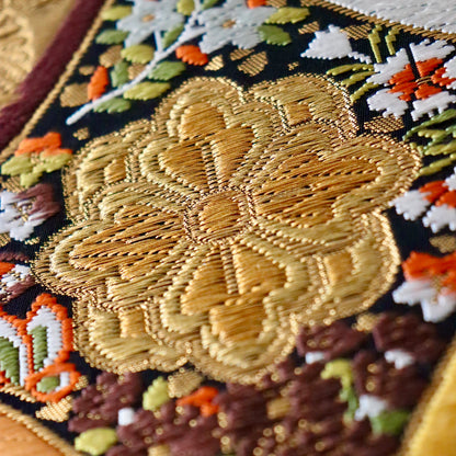 袋帯「彩七宝寿蝶華文」河合美術織物