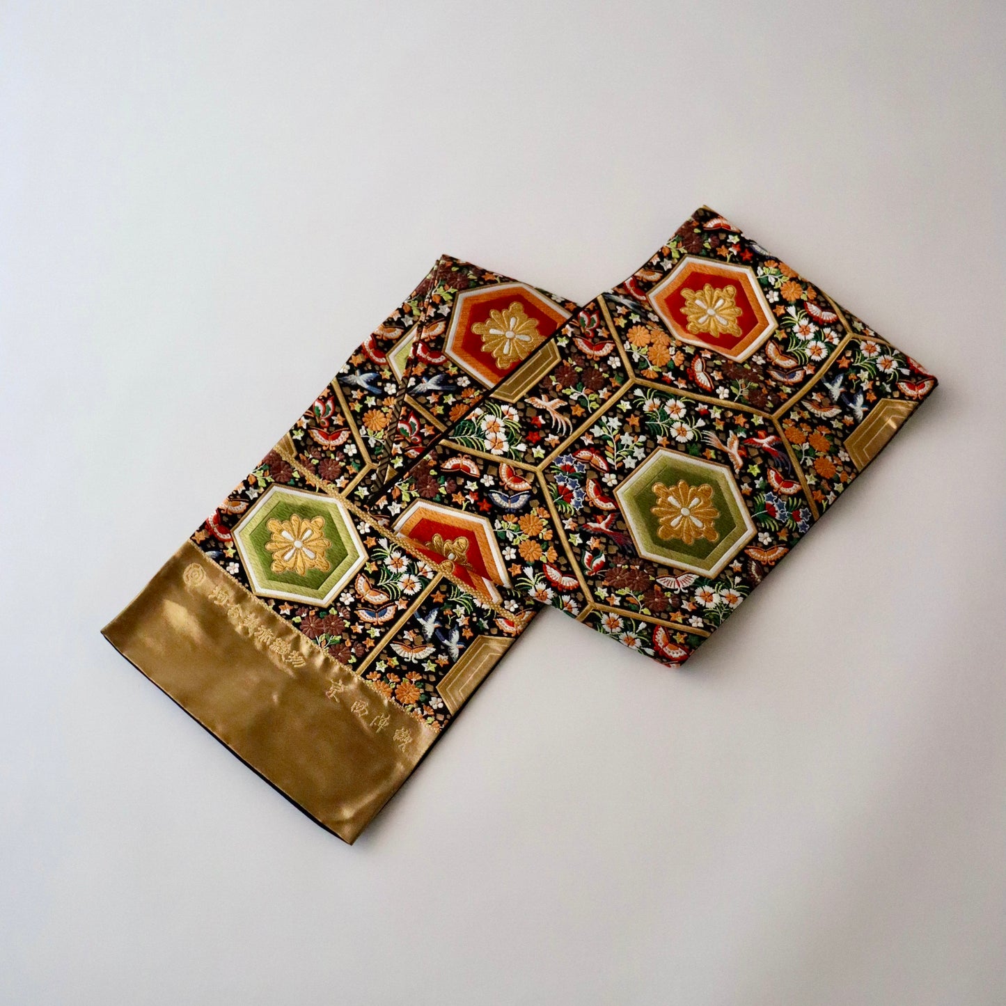 袋帯「平家経巻亀甲文」河合美術織物