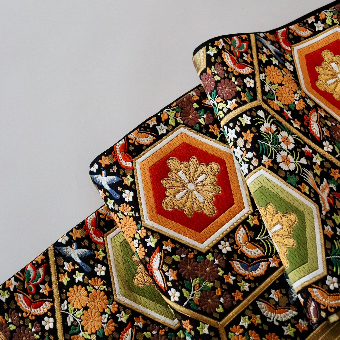 袋帯「平家経巻亀甲文」河合美術織物