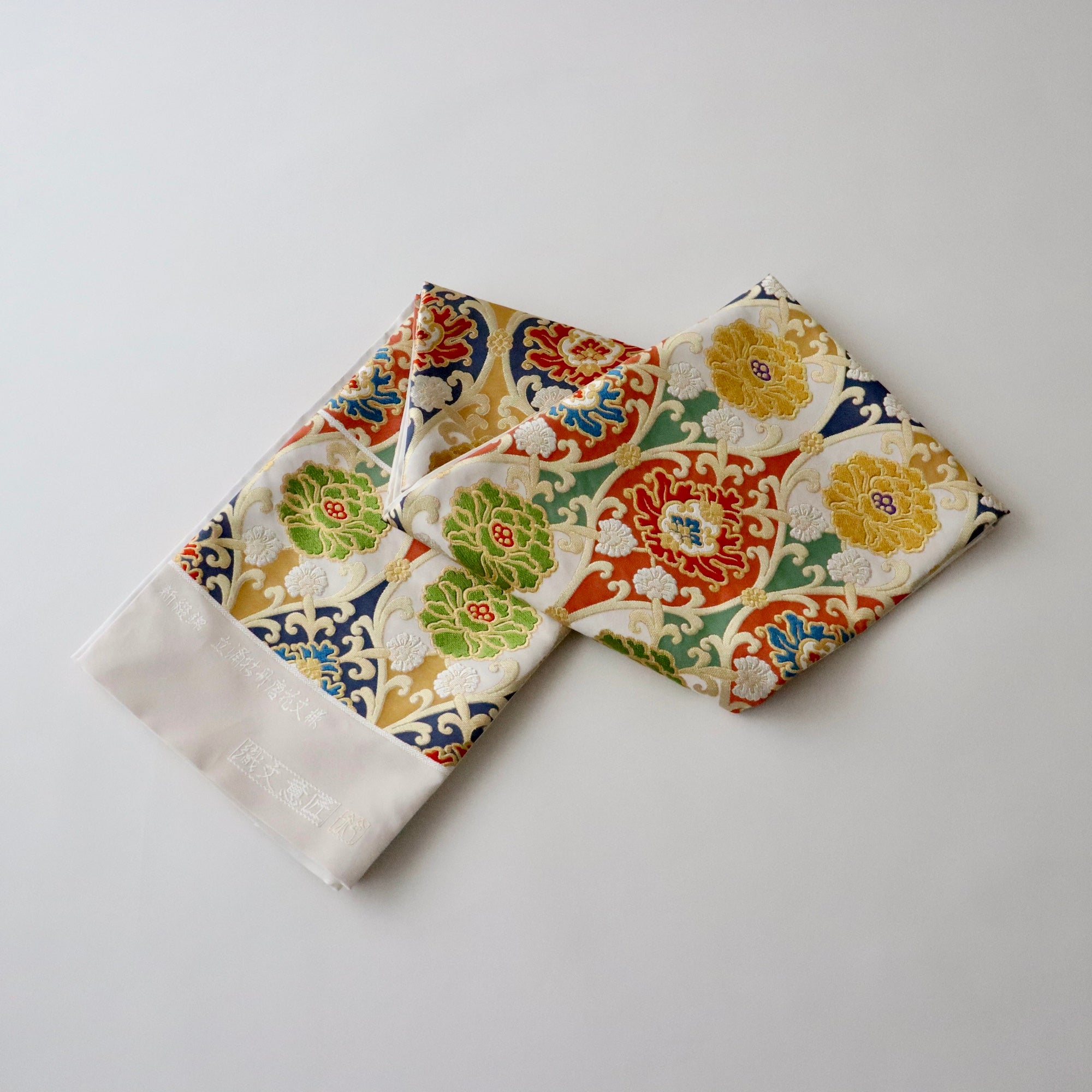 袋帯「新綴錦 - 立涌牡丹唐草文様」織文意匠鈴木 – 荒井呉服店