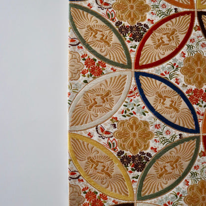 袋帯「彩七宝寿蝶華文」河合美術織物