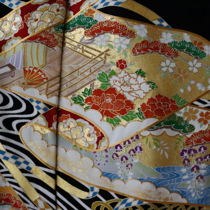 黒留袖「手描き京友禅 - 波に巻物」髙橋啓