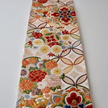 袋帯「寿祥秀花七宝文」河合美術織物