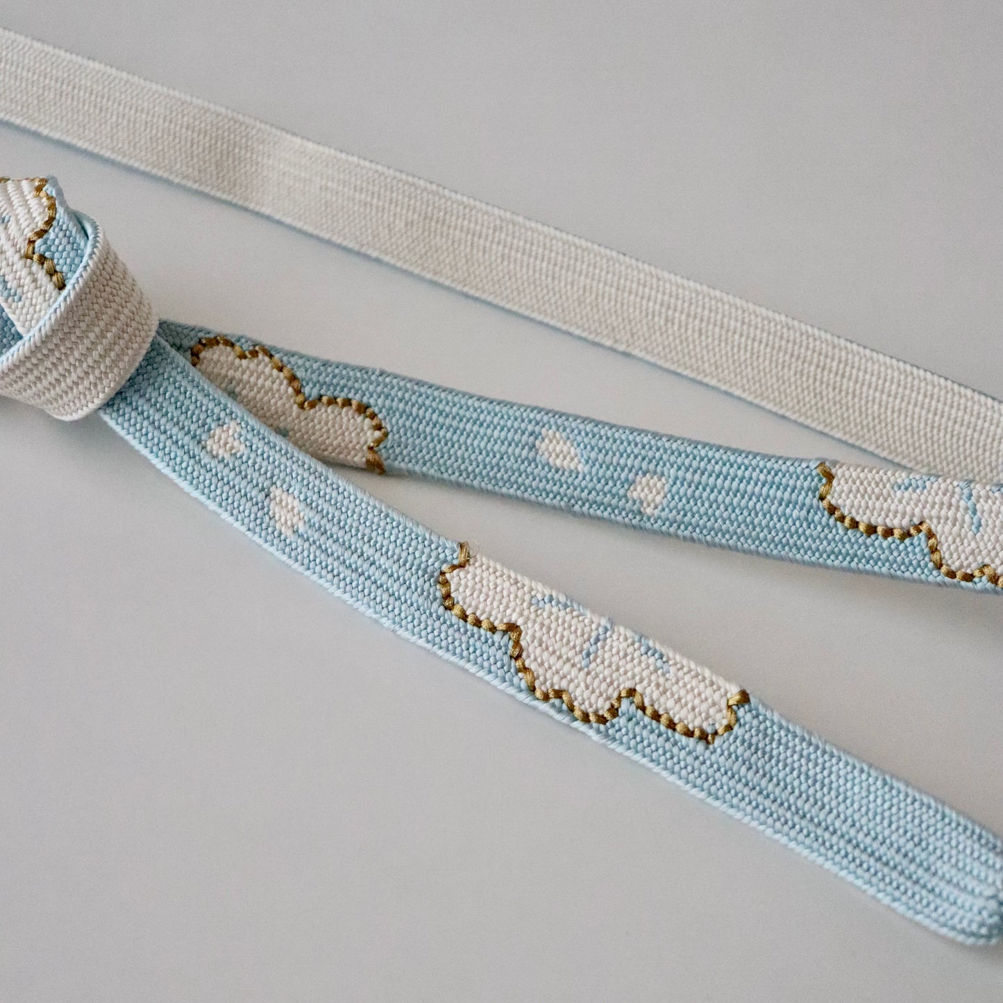 帯締め「高麗組 - 桜に花びら sky」大原商店