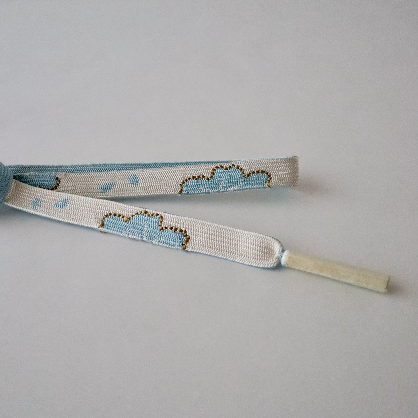 帯締め「高麗組 - 桜に花びら sky」大原商店