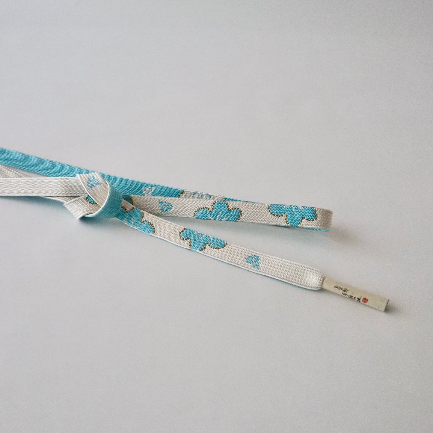 帯締め「高麗組 - 桜に花びら lt blu」大原商店