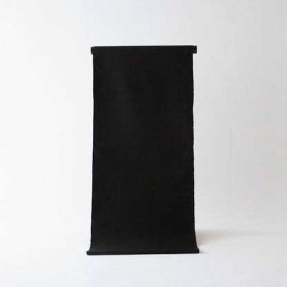 本場 久米島紬「無地/泥染」織手：翁長ヤス